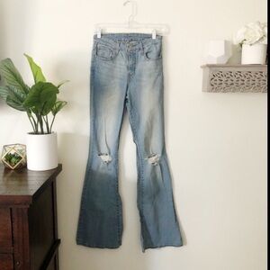 Levis light wash flare bottom distressed knee jeans size 28